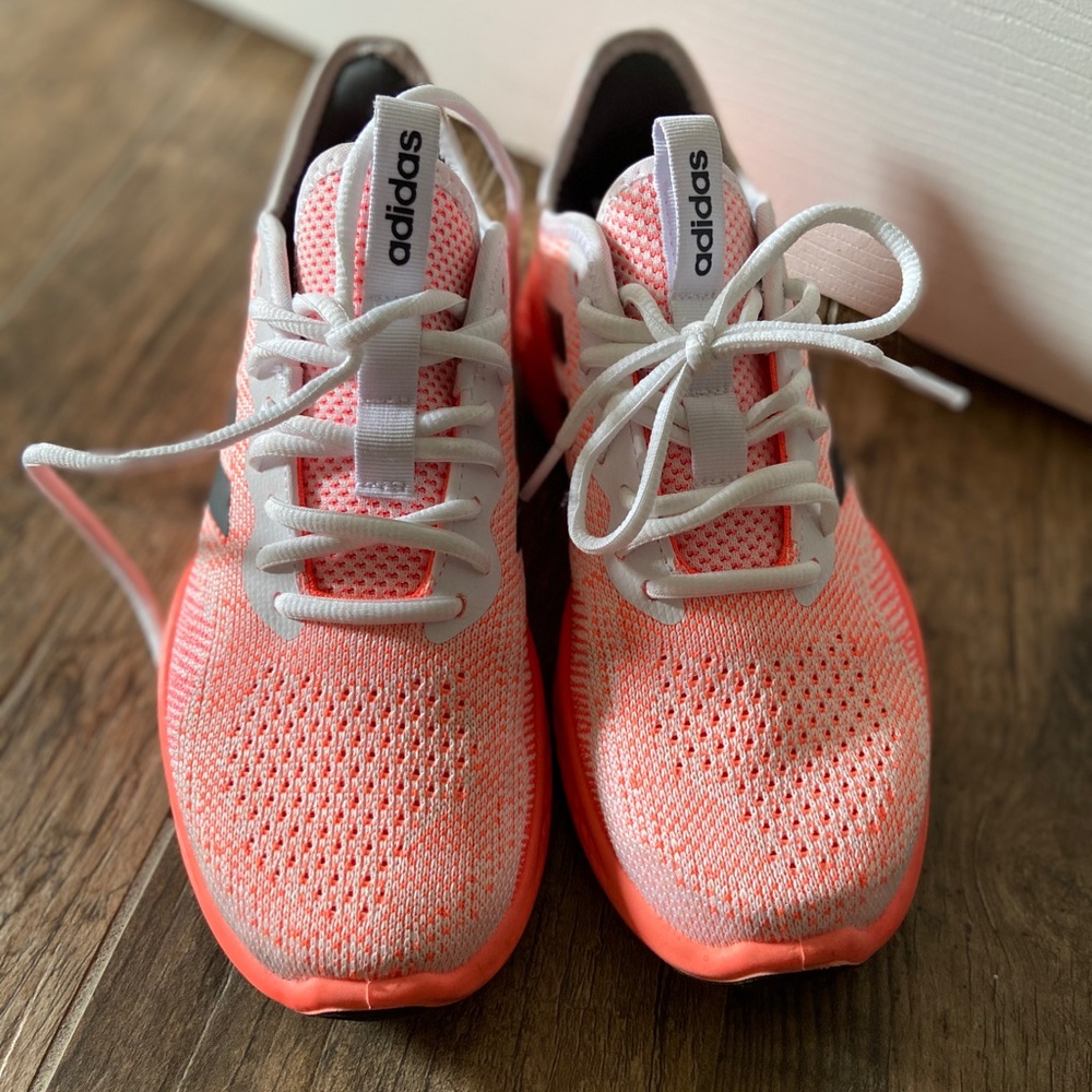 Adidas Bounce running shoes in coral/neon pink